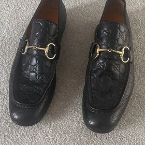 Gucci Black Embossed Leather Loafers with Gold Detail